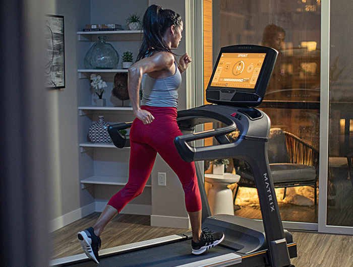 Woman running on Matrix Treadmill